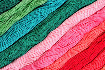 Colorful skeins of floss as background texture