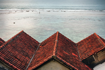 Roof looking over the rainy sea
