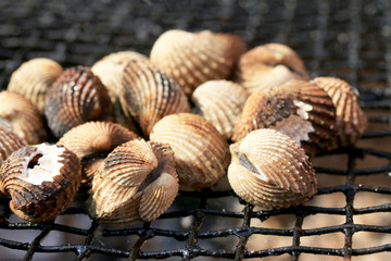 cockles on the grill.