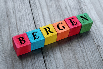 word Bergen on colorful wooden cubes