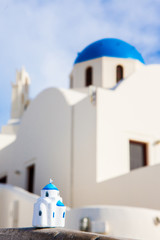 Greek church with a miniature souvenir house