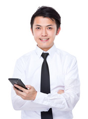 Young businessman use of cellphone