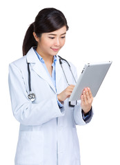 Asian doctor use of tablet pc