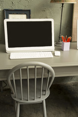 computer on teble in worinking room