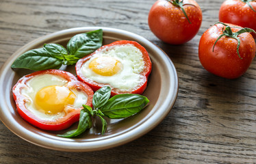 Fried eggs in bell pepper slices
