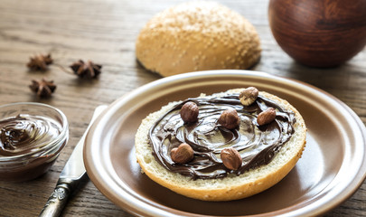 Sesame bun with chocolate cream and nuts