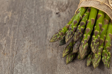 Bunch of fresh asparagus. Selective focus.