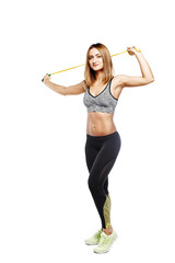 pretty fitness girl stay with jumping rope