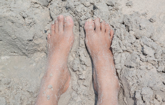 feet in sand beach