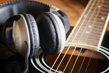 instrument guitar headphones and microphone