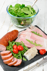cold meats plate with tomatoes