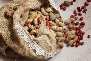 Peanut in a peel and shelled