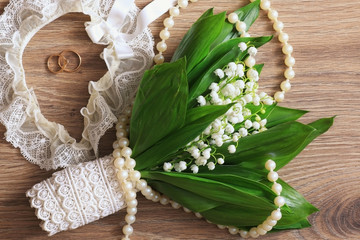 Wedding bouquet of lilies of the valley accessory ring