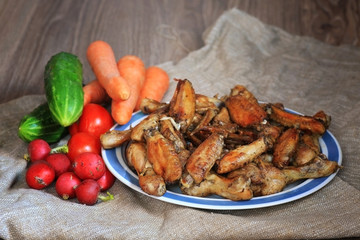 chicken wings and drumstick served with