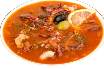 meat soup with lemon, olives