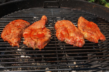 Pork smoked barbeque cooked on charcoal grill