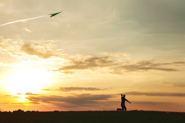 Obraz na płótnie Canvas A man launches a kite 