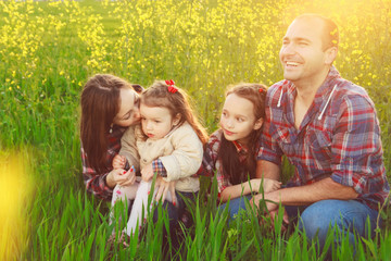 Fototapeta premium family in the field. 