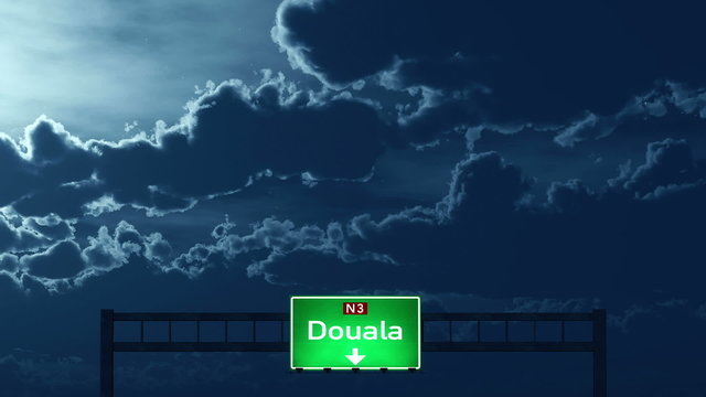 Passing under Douala Cameroon  Highway Road Sign at Night
  