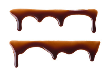 Flowing chocolate drops / Melted chocolate dripping set on white background