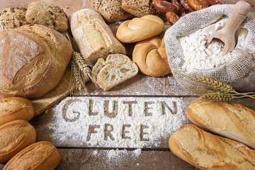 a gluten free breads on wood background - obrazy, fototapety, plakaty