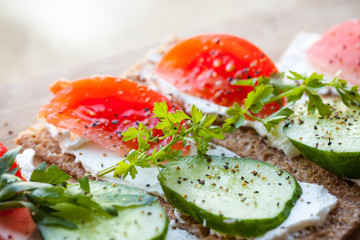 Healthy food theme. Bright sandwiches with tomato