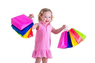 Little girl with shopping bags
