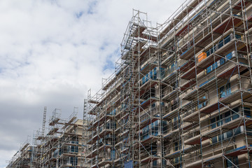 new building construction site with scaffolding