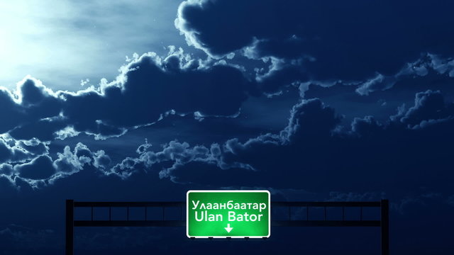 Passing under Ulan Bator Mongolia Highway Road Sign at Night
  
