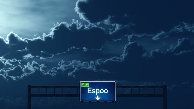 Passing under Espoo Finland Highway Road Sign at Night
  