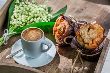 Tasty sweet muffin and hot coffee
