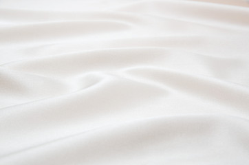 Obraz na płótnie Canvas white satin fabric as background