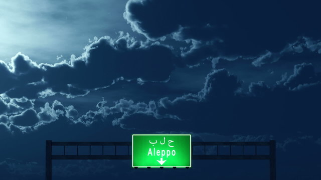 Passing under Aleppo Syria Highway Road Sign at Night
  