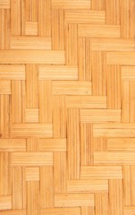 Wooden grid background of braided wood