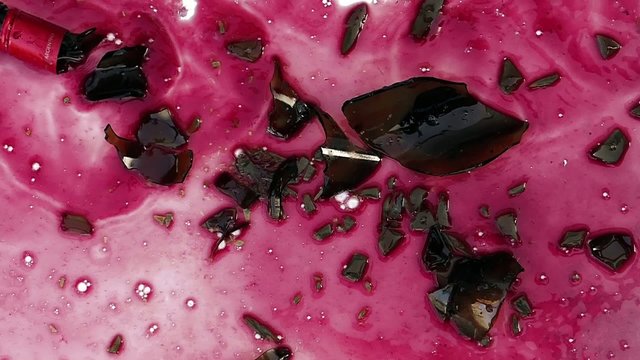 Wine Bottle Smashes On White Floor Surface