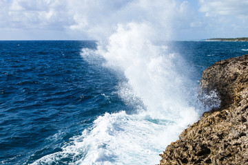 Powerful Waves crushing on a rocky beach