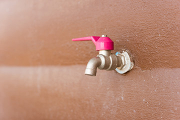faucet on wall
