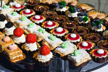 a lot of different sweets on the table