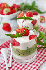 Creamy dessert with strawberries and kiwi