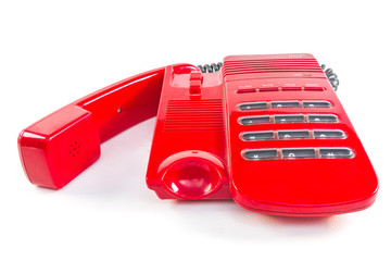 Fototapeta premium red telephone isolated on white background 