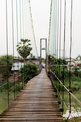 hanging wood bridge, Sukhothai, Thailand