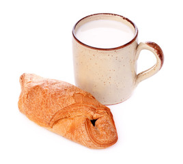 Crispy Bun and Mug of Milk