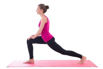 young beautiful sporty woman doing stretching exercise on yoga m