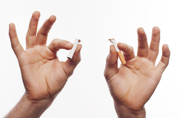 Hand crushing cigarette