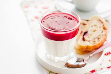 Greek Yogurt with Berry Sauce and Slices of Sweet Bread