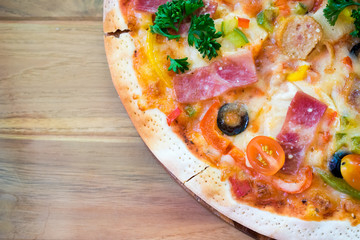 pizza on wooden dining table
