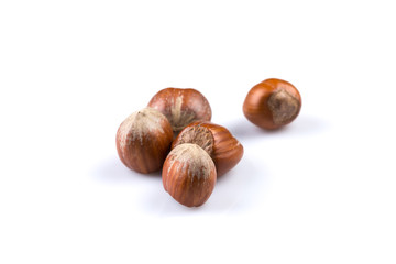 Hazelnuts on white