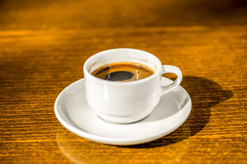 morning creativity concept of full cup fresh black Turkish coffe