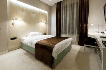 Interior of a luxury double bed hotel bedroom