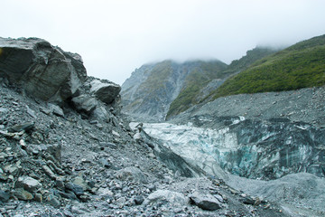 Blue Ice and Gray Rocks of Fox Glacier, New Zealand